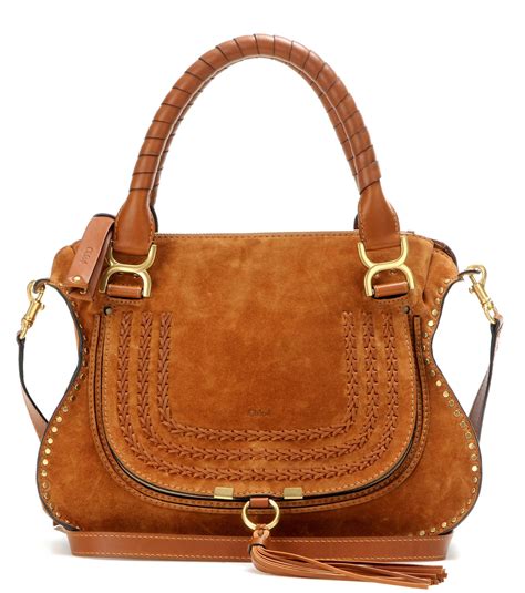 brown suede shoulder bag.